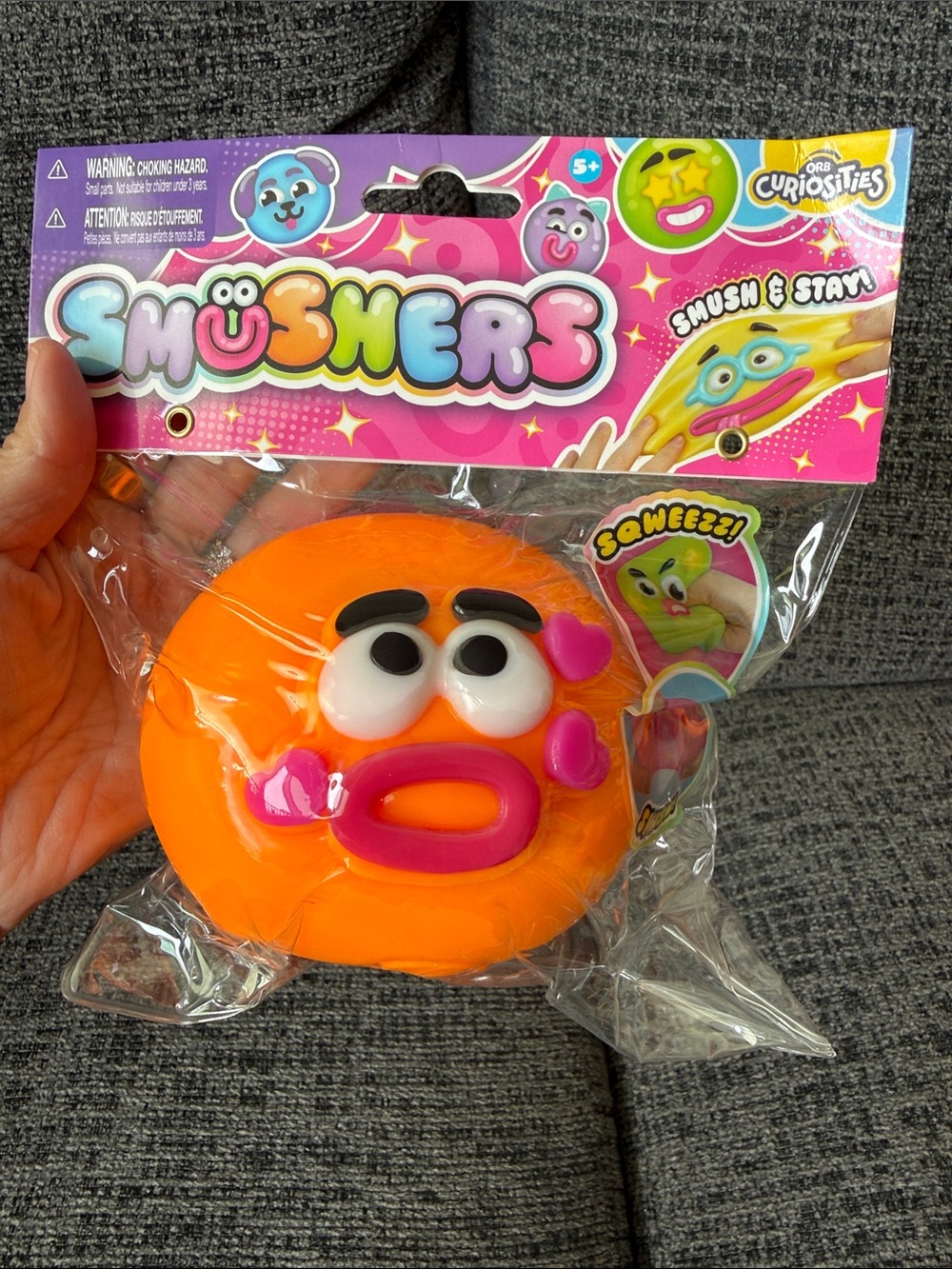 BNIB ORB Curiosities SMUSHERS Squishy, Orange Face w/Heart Cheeks